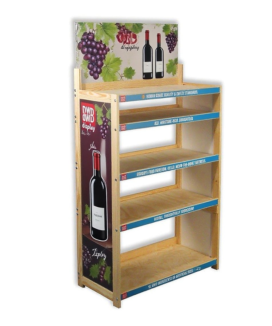 Empty wooden retail display shelf with wine-themed promotional graphics on the side and back panels, showing a wine bottle and grapevine images, designed for selling wine bottles.