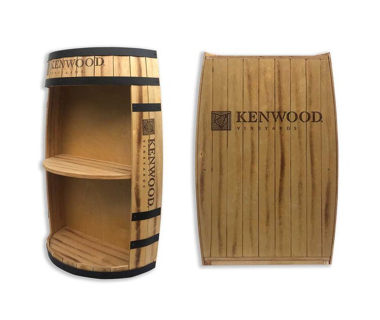Wooden wine barrel-shaped shelving unit with Kenwood Vineyards logo, opened on the left and closed on the right.