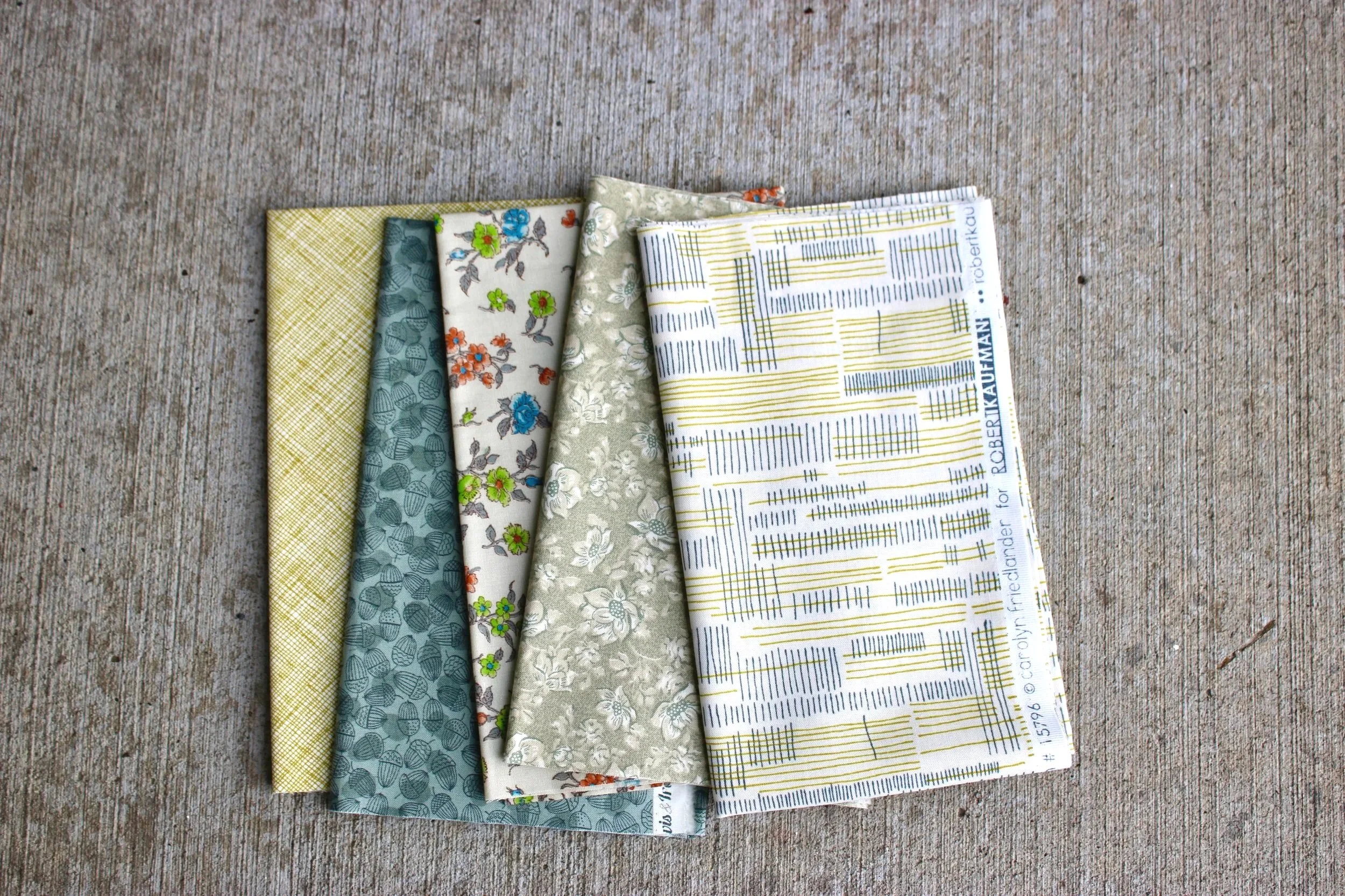 Bundle of five quarter yard cuts yellow greens