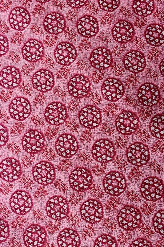 Pink and red floral circles fabric