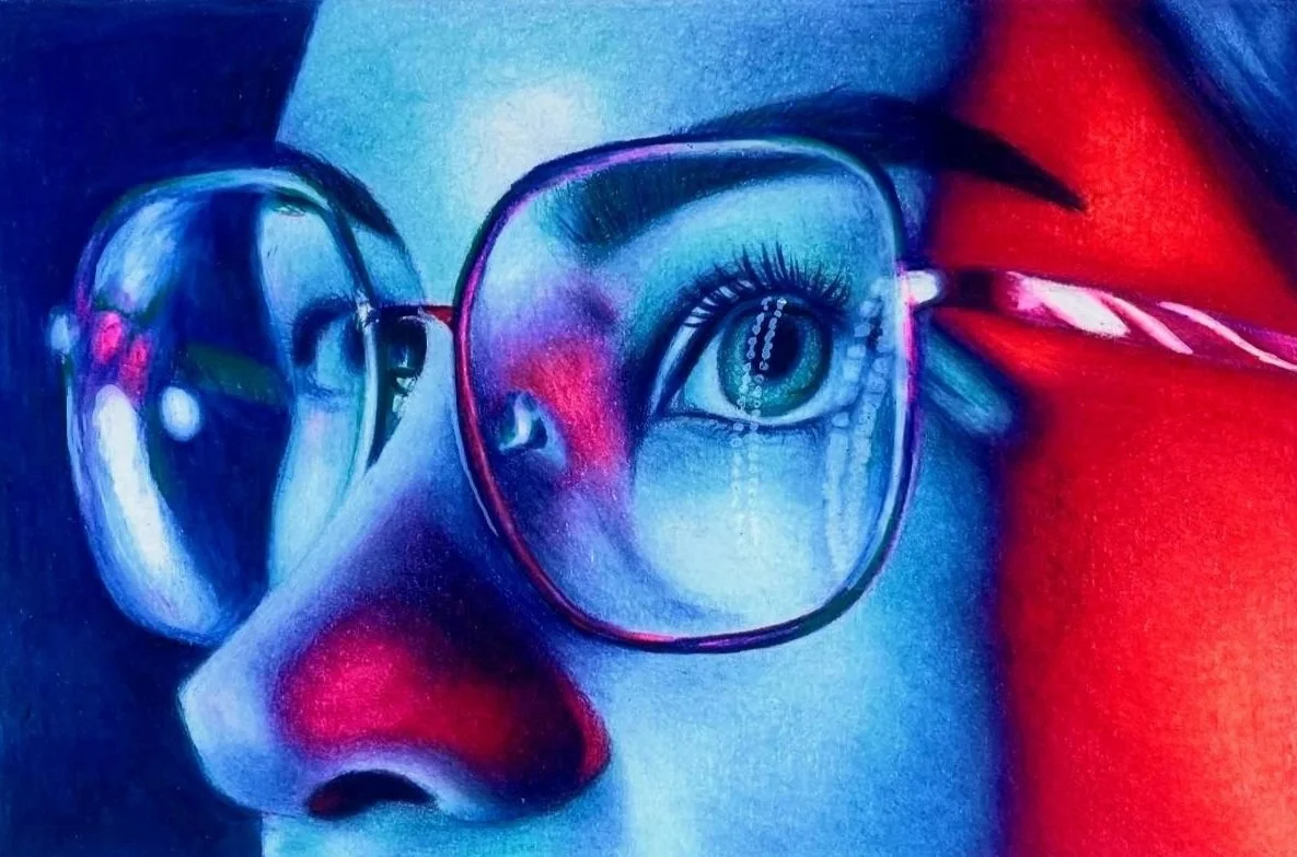 Close-up of a person wearing glasses, with a reflection of an eye in the lens, abstract colorful artwork with shades of blue, red, and purple.