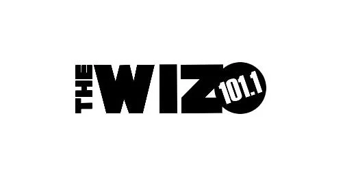 Logo for The WIZ 101.1 radio station in black and white.
