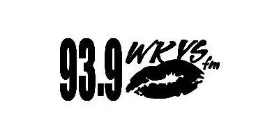 Radio station logo with the frequency 93.9, the text "WKS fm", and a pair of lips graphic.