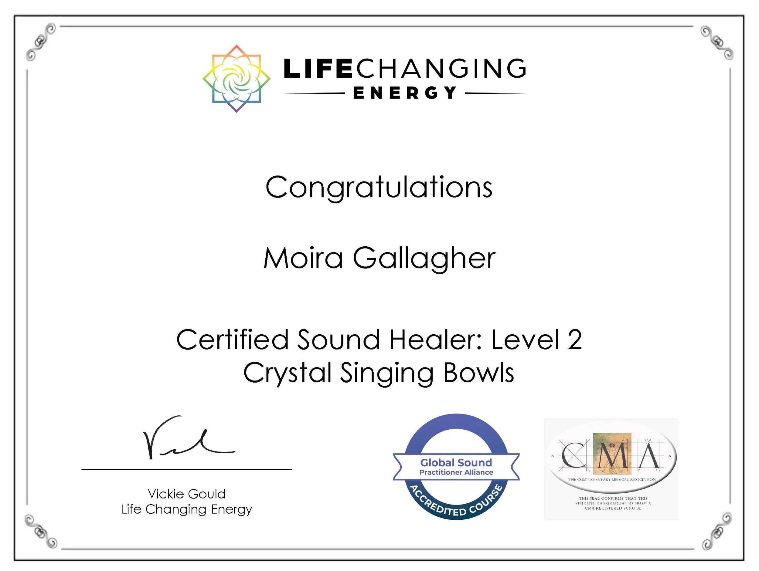 Certificate of completion for Moira Gallagher from Life Changing Energy, certified sound healer Level 2 with crystal singing bowls, signed by Vickie Gould. Contains logos from Global Sound Practitioner Alliance and The Complementary Medical Association.