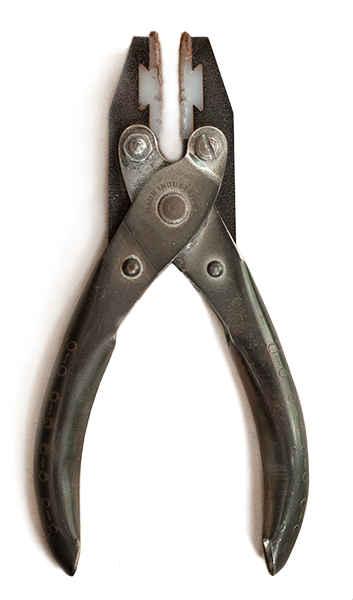 A pair of metal pruning shears with black handles.
