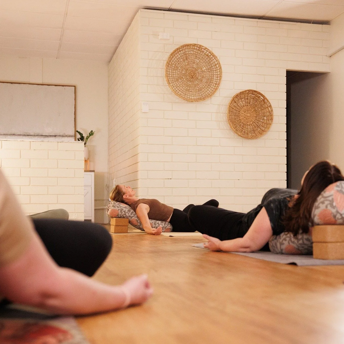 Have you tried our Restorative Classes yet?
Restorative Yoga is a deeply relaxing practice designed to help the body and mind unwind. Using supportive props such as bolsters, blankets, blocks and straps, the body is gently held in comfortable poses f