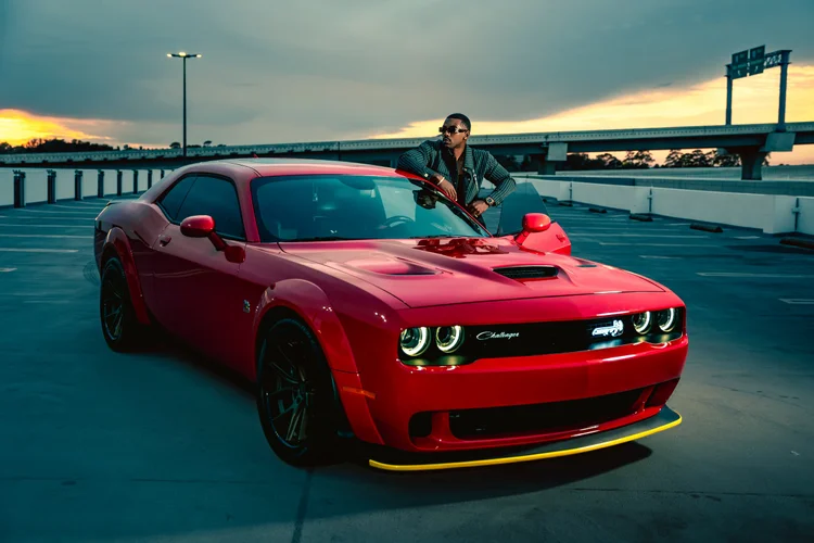 Red Dodge Challenger brand film shoot in Houston at sunset
