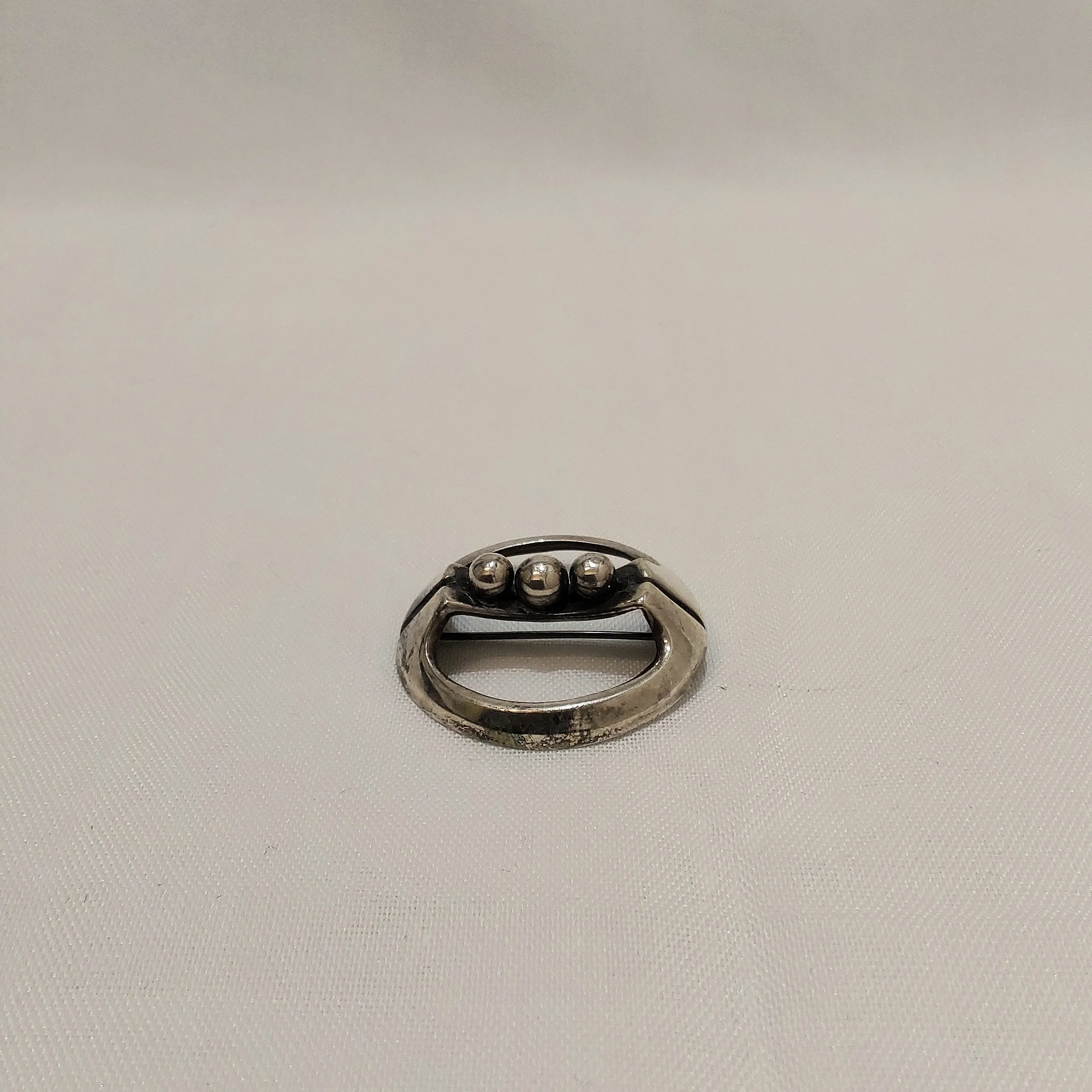 Hopeinen rintakoru, Erik Granitin