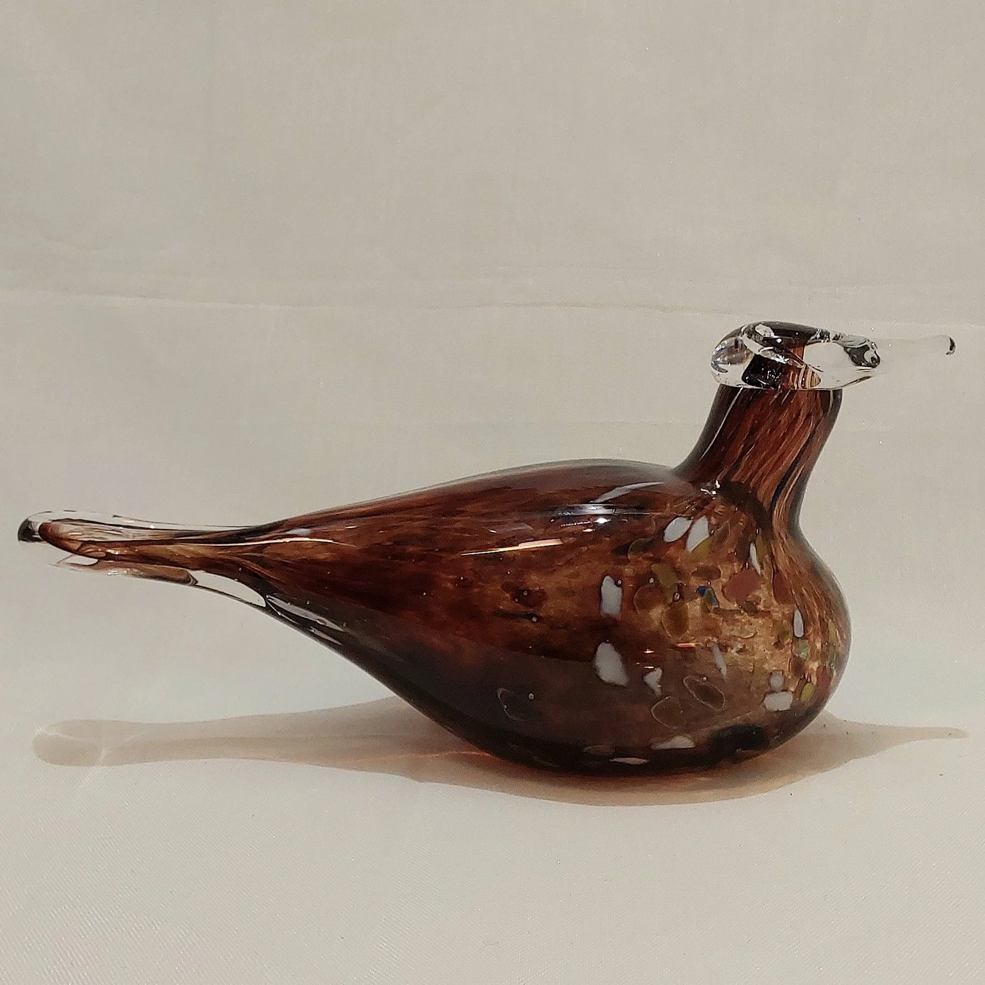 Lasilintu, ruskea, (Signeerattu, Asmo Uutela)