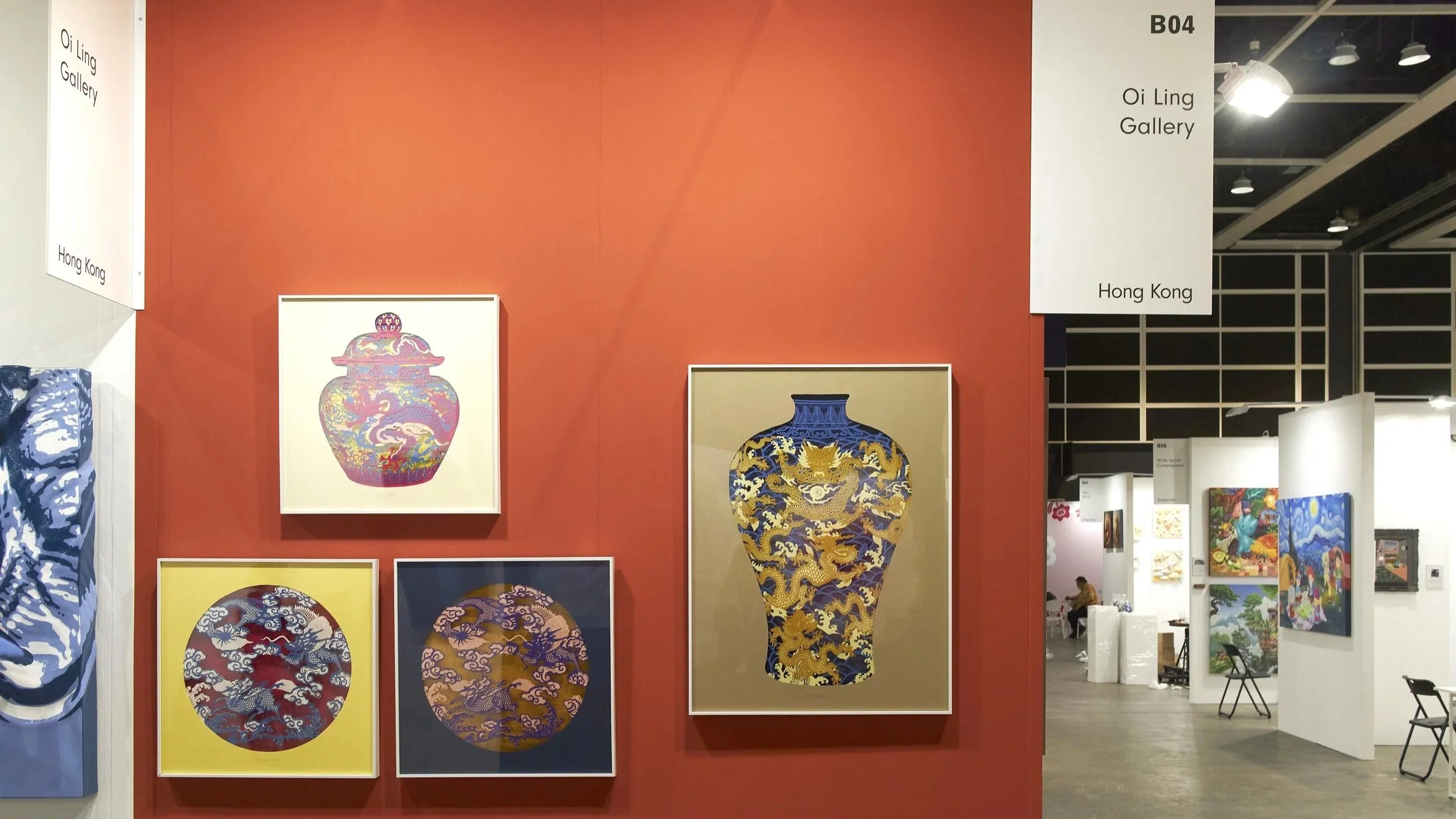 Affordable Art Fair 2025: Art exhibition at the Ocean Ice Gallery showcasing colorful paintings of traditional Chinese vases with dragons and cloud motifs.