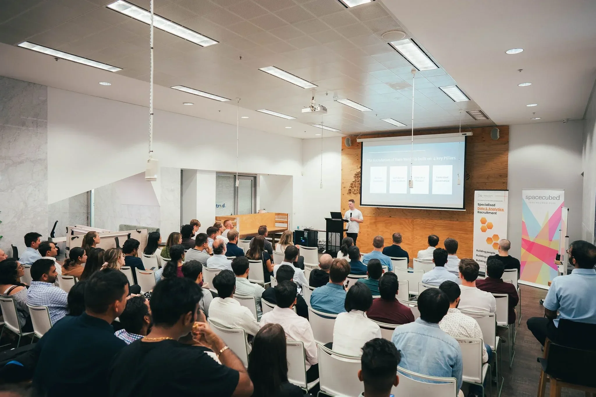 People together at a conference.