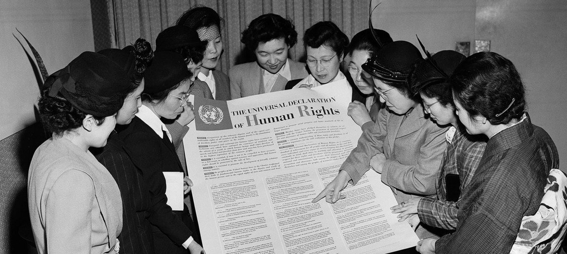 UN Photo A group of Japanese women examine the Universal Declaration of Human Rights during a visit to the UN's interim headquarters in Lake Success, New York, in February 1950