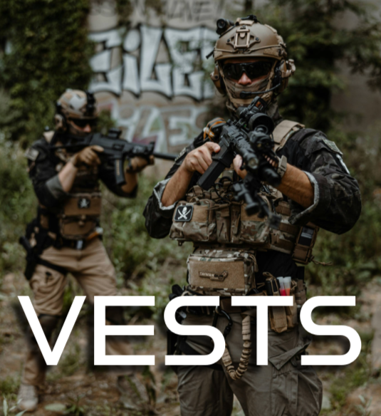 Two soldiers in tactical gear aiming rifles outdoors, with the word "VESTS" overlaid at the bottom.