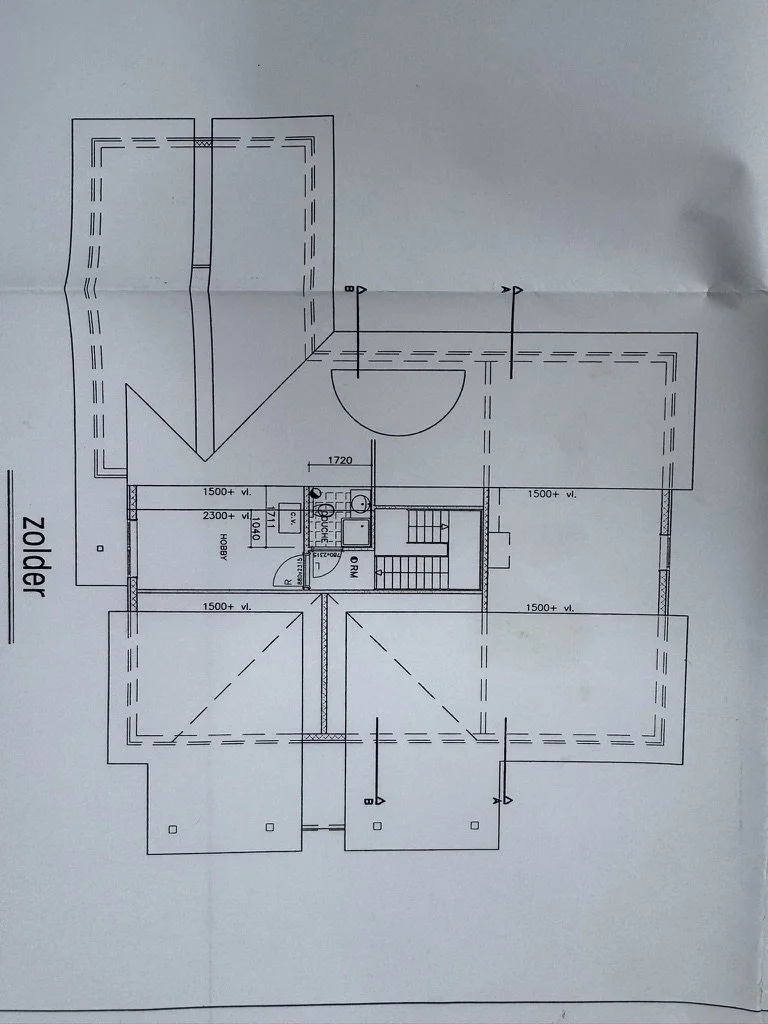 Architectural floor plan for the top floor of a building, showing rooms, stairs, and measurements.