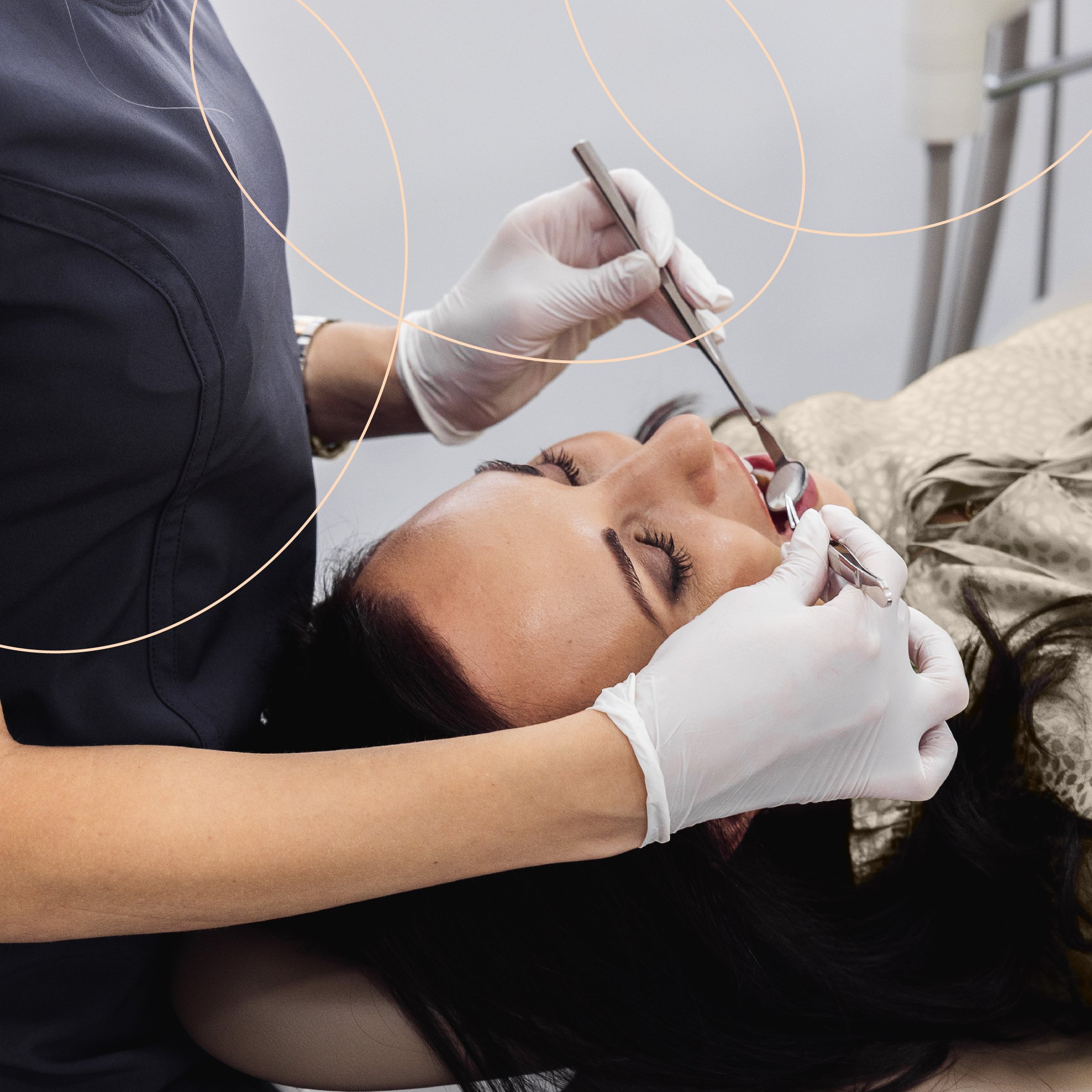 Close-up of a dentist checking on a patient