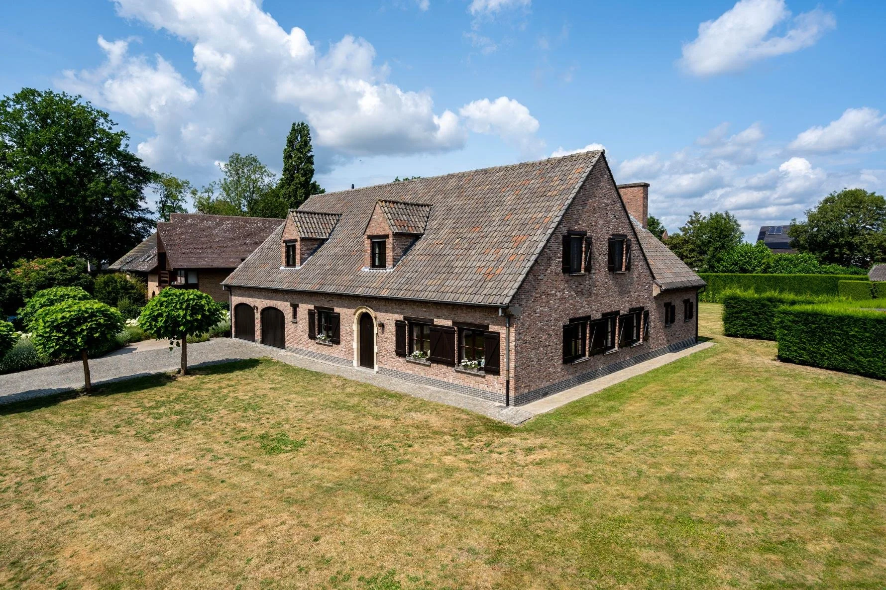 Mastfotografie van een alleenstaande woning in de Pinte