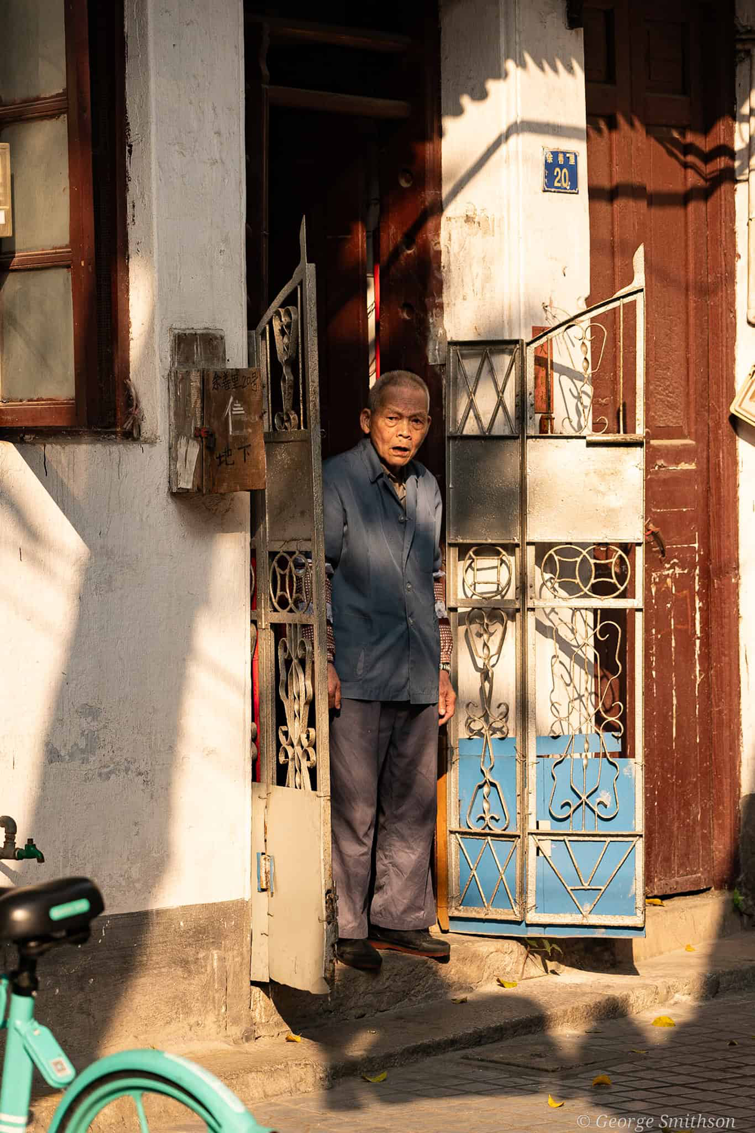 Watching the world go by. Guangzhou, China, 2022.