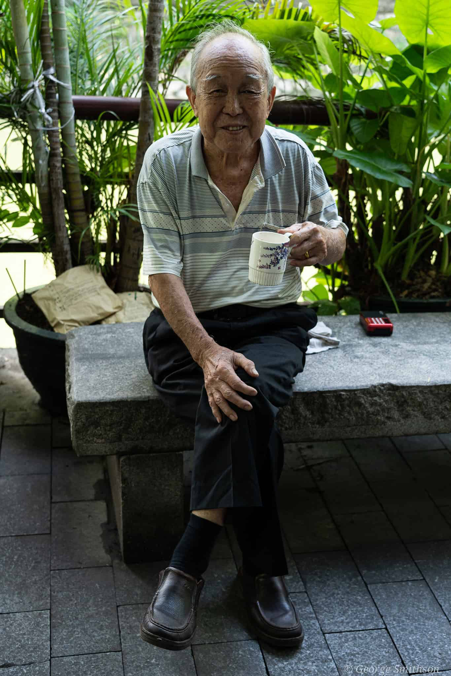 Smiling elderly man; a silent connection beyond language and words. Guangzhou, China, 2022.