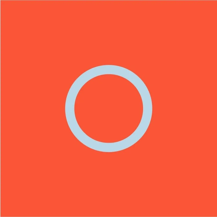 A light blue circle on an orange background.