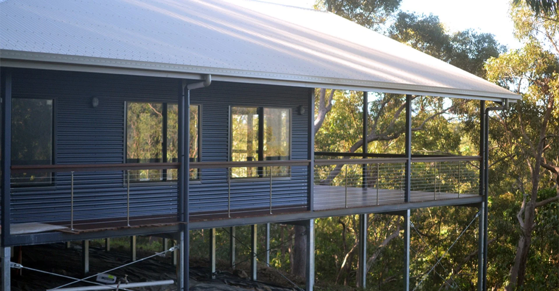Elevated Structural Steel House in the Rainforest