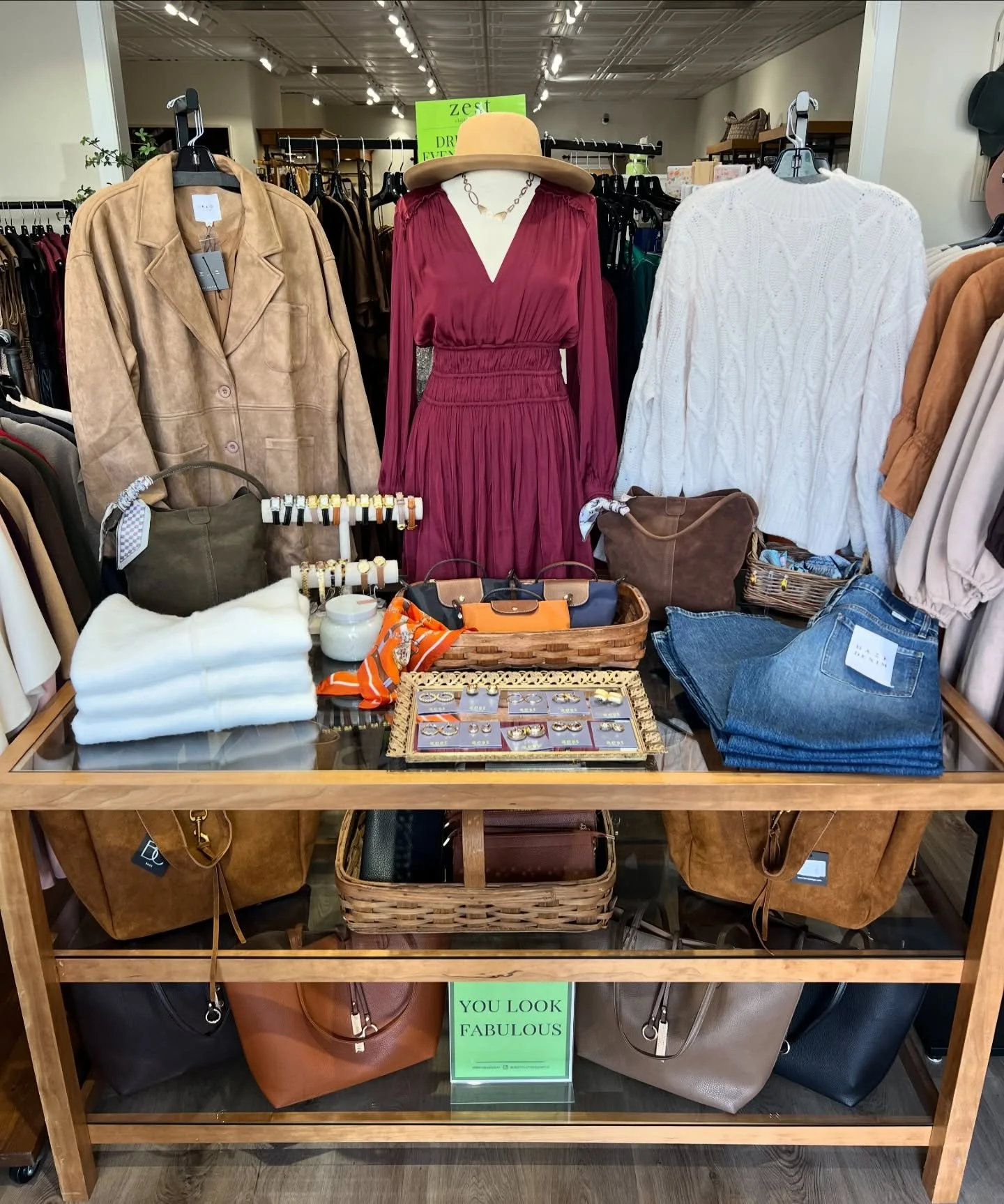 Your fall outfit inspo table is set 🤎 From chunky sweaters to suede jackets and the cutest bags to match!! We have everything you need to step into October in style! #FallFashion #ZestFinds