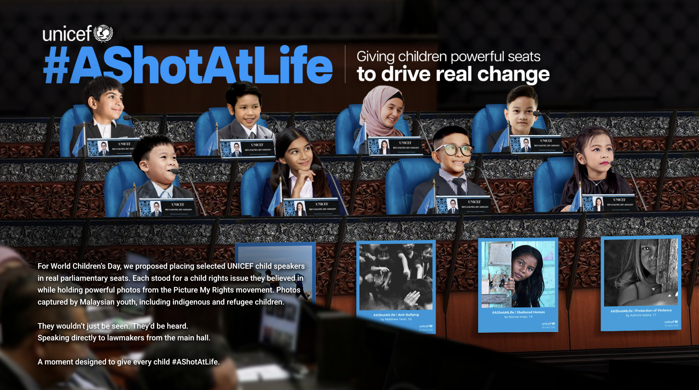 Children of different ethnicities sitting in genuine parliamentary seats, holding photos and placards supporting child rights, with a displayed banner for UNICEF's #AShotALife campaign highlighting stories of refugee and indigenous children for World Children's Day.