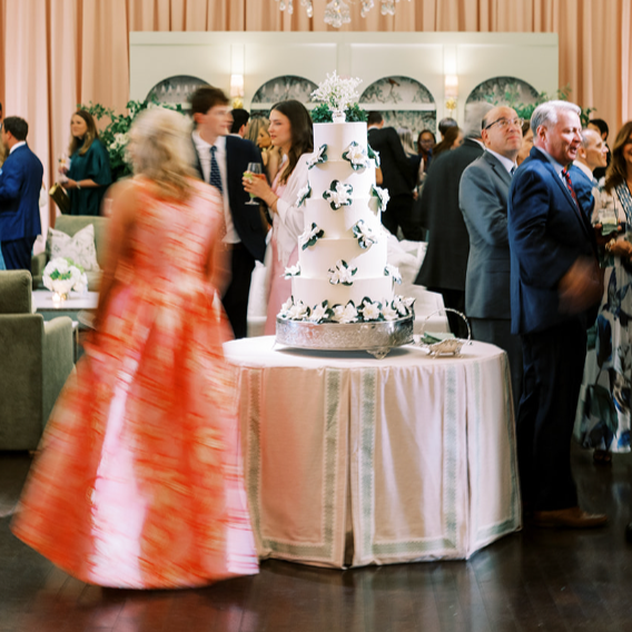 pink box pleated with green trim tablecloth