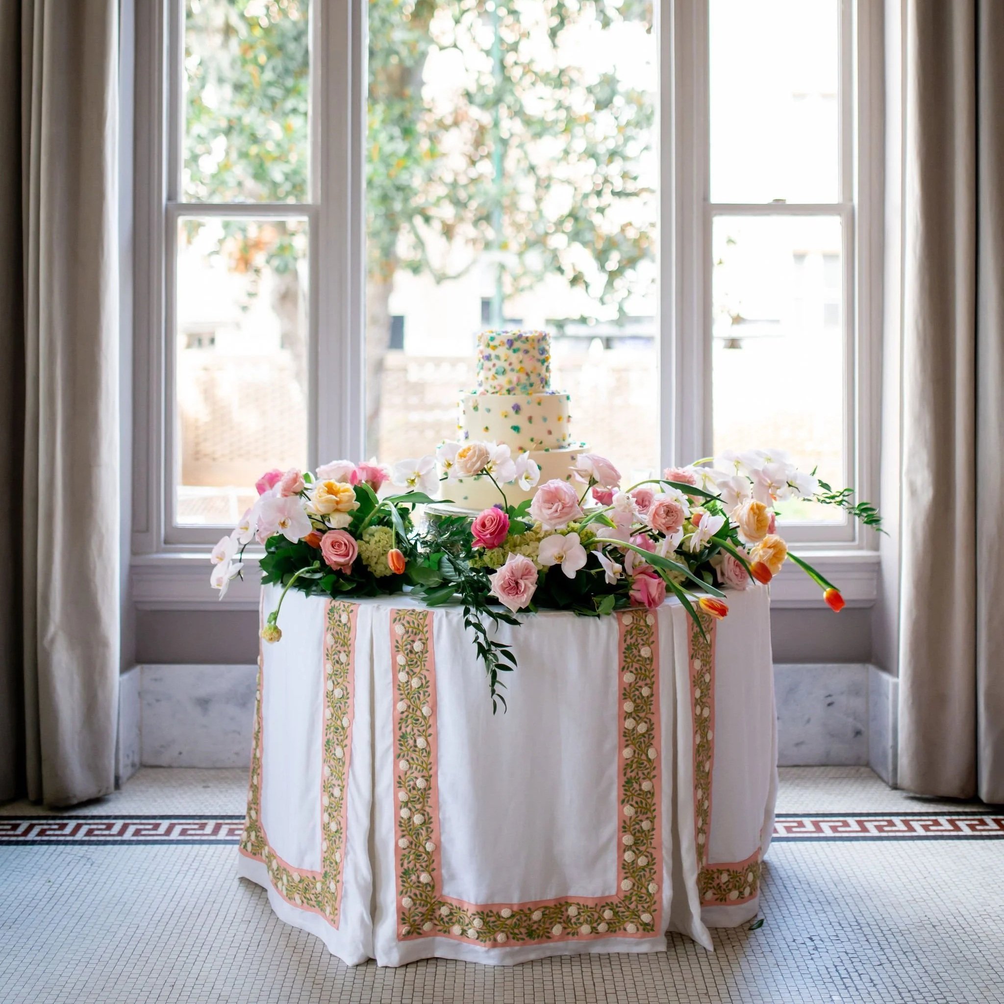ivory tablecloth with pink trim