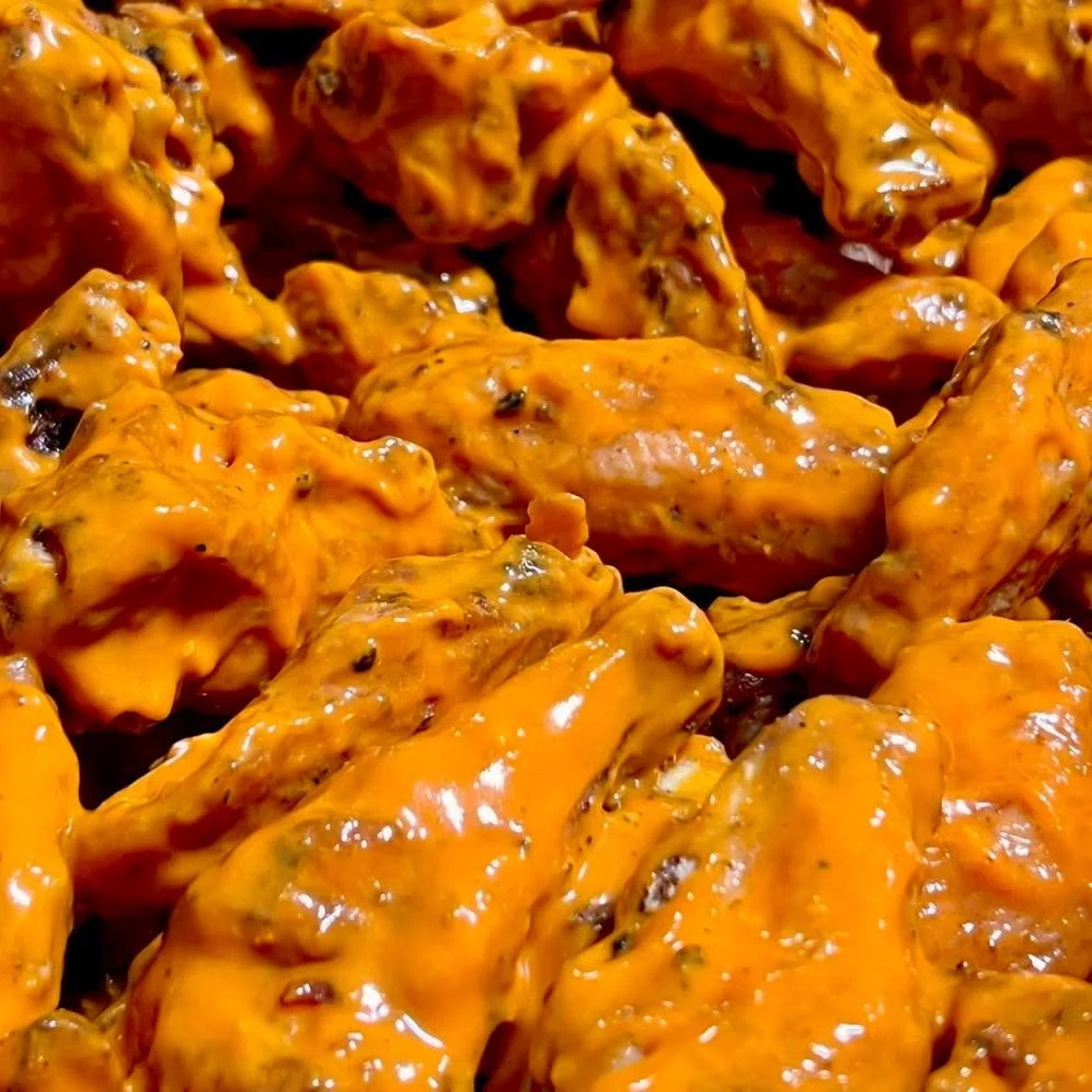 Smoked wings are in- just in time for game day!  We take Misty Knoll Farm’s chicken and dressed them with spices, smoke them, and toss them with our buttery buffalo sauce. Yum!