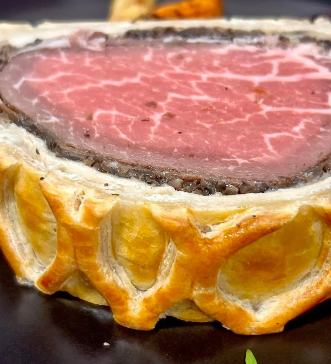 ✨ Beef Wellington Season is Here! ✨
Our Beef Wellington starts with tender beef tenderloin, wrapped in savory mushroom duxelles, layered with prosciutto, and tucked into golden, flaky puff pastry. It&rsquo;s rich, elegant, and absolutely perfect for 