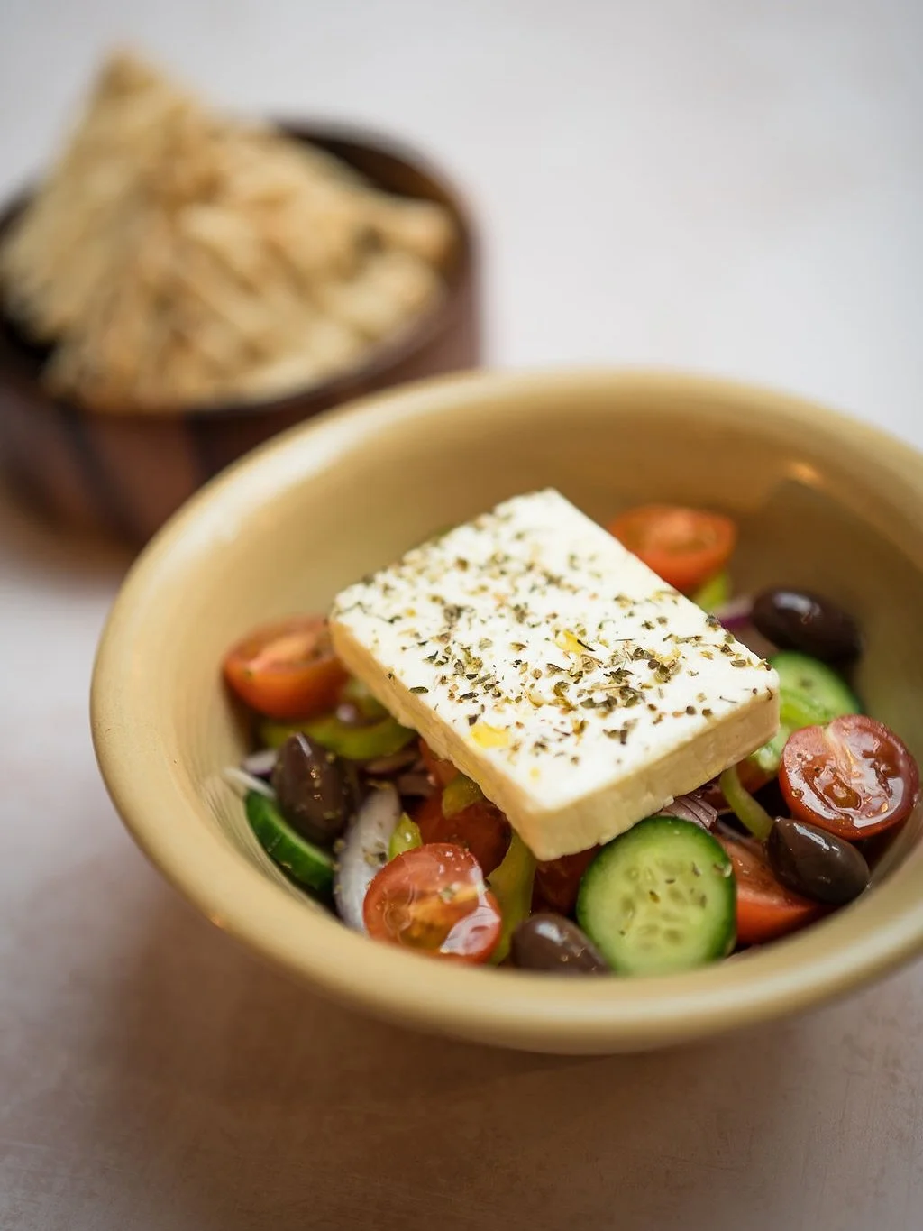 The real Greek Salad 🇬🇷

No lettuce, no fuss &mdash; just ripe tomatoes, crisp cucumbers, peppers, onions, Kalamata olives, and a big slab of feta on top. Drizzled with olive oil, sprinkled with oregano &mdash; fresh, simple, perfect ✨

Born in Gre