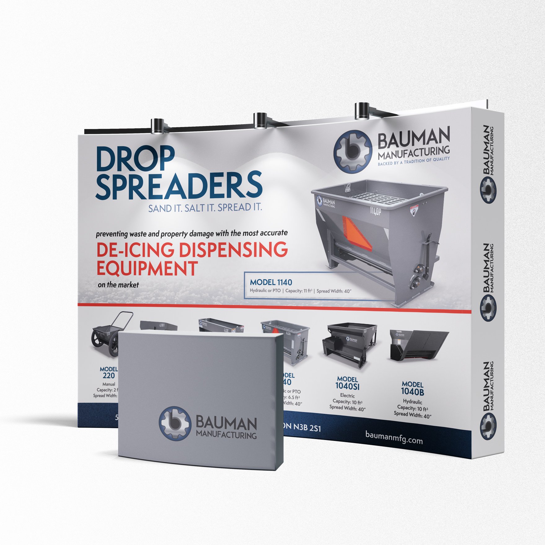 Display of Bauman Manufacturing drop spreaders for de-icing, with various models and a grey box featuring the Bauman logo.