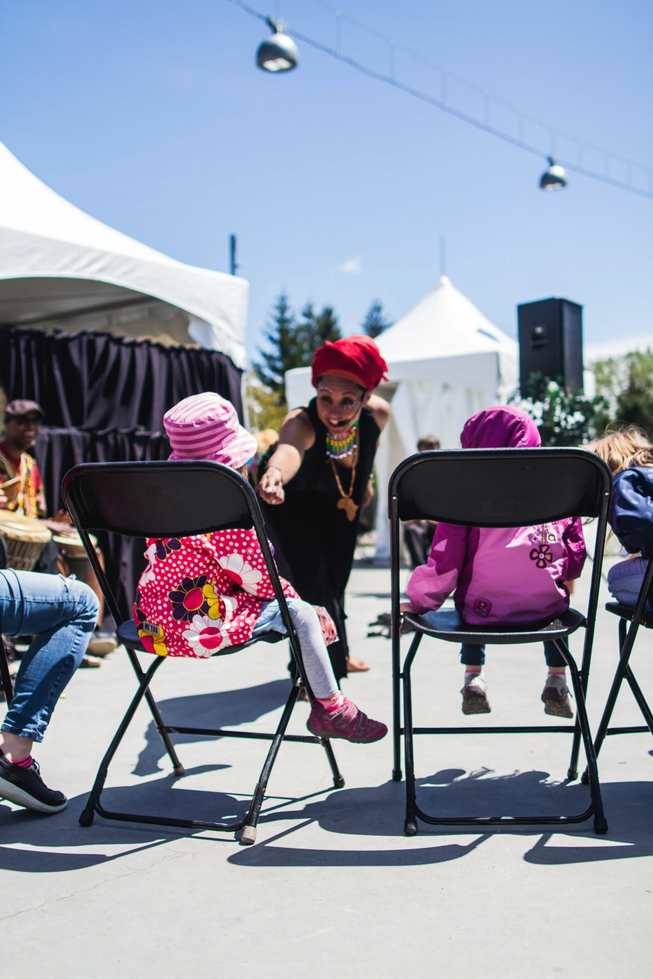 Jacqui+at+a+festival+with+kids.webp