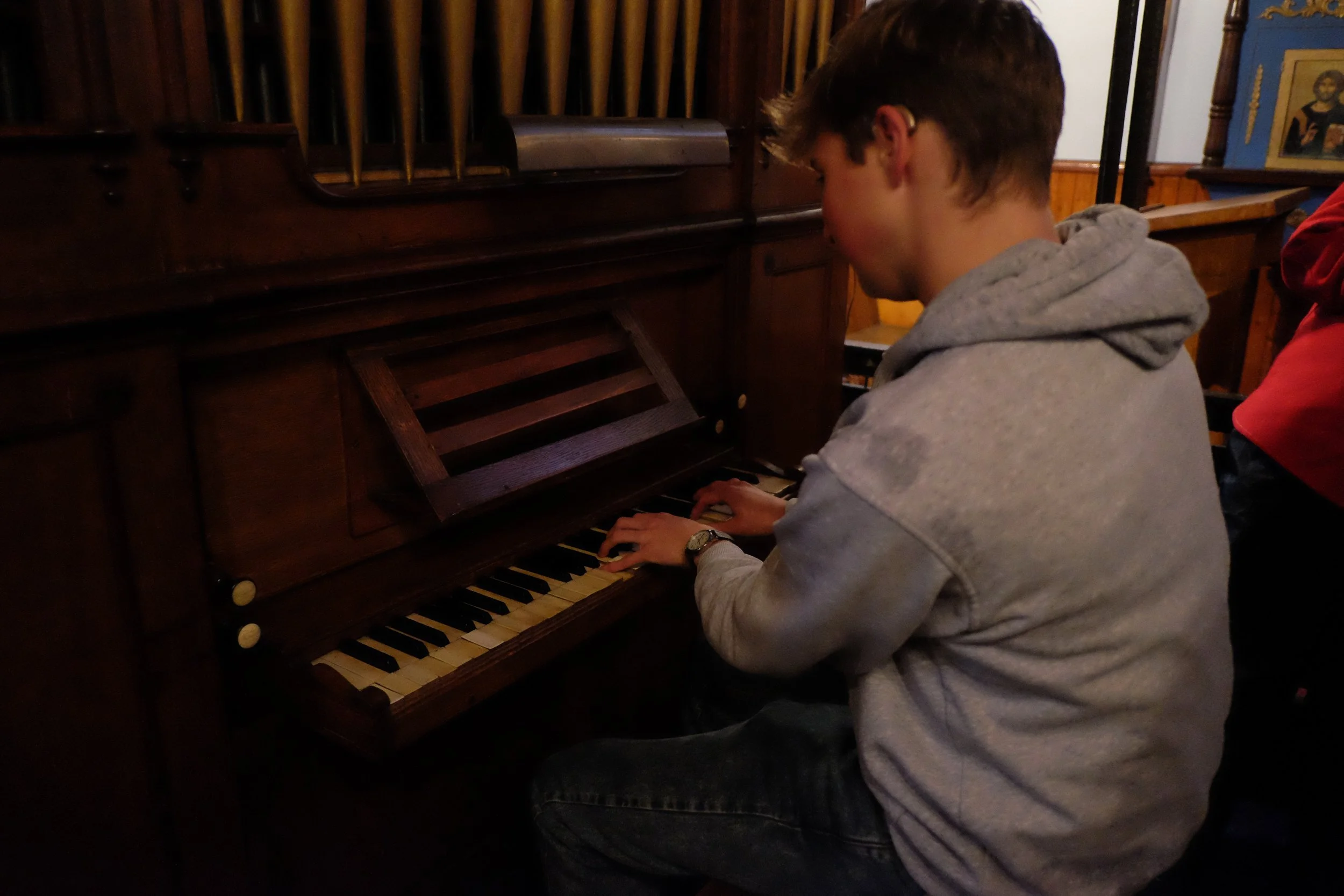 St Mary's organ and student.jpeg