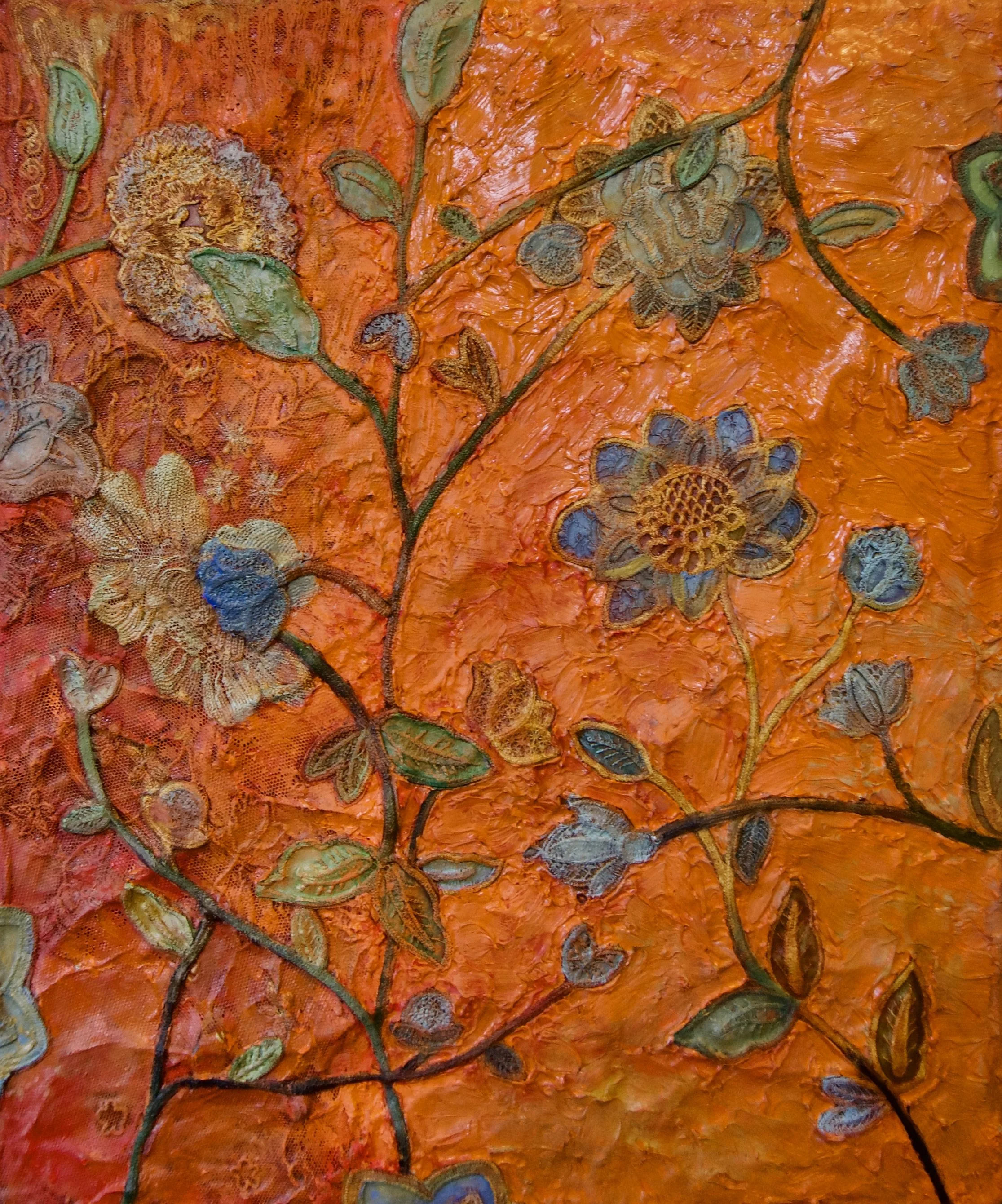 Natasha Zupan Afterglow #17, mixed media collage on wood with bright orange thick texture background and floral pattern overlay with pops of blue petals and green vines