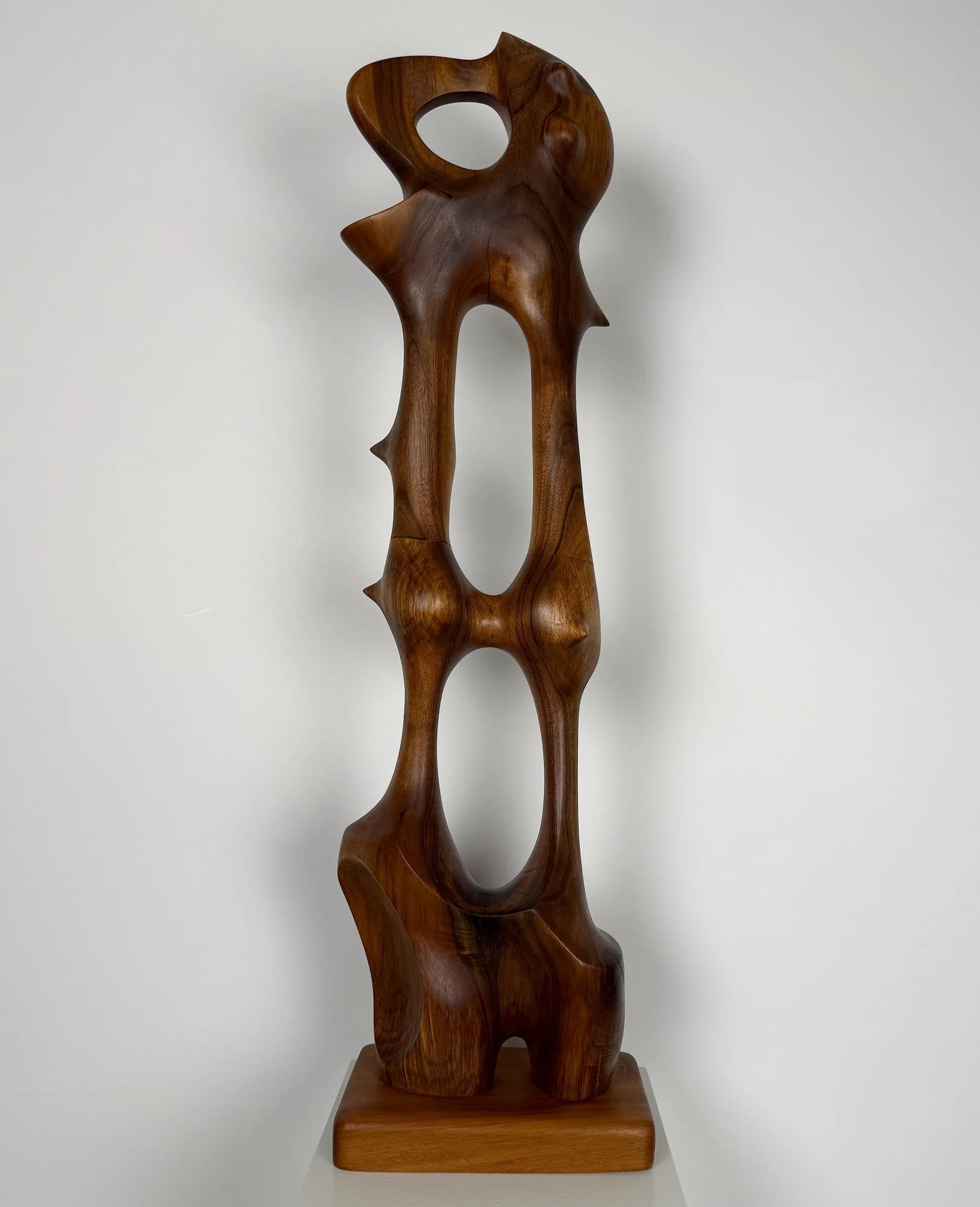 Fermin Castro - Guardian I, abstract standing wooden sculpture, black walnut