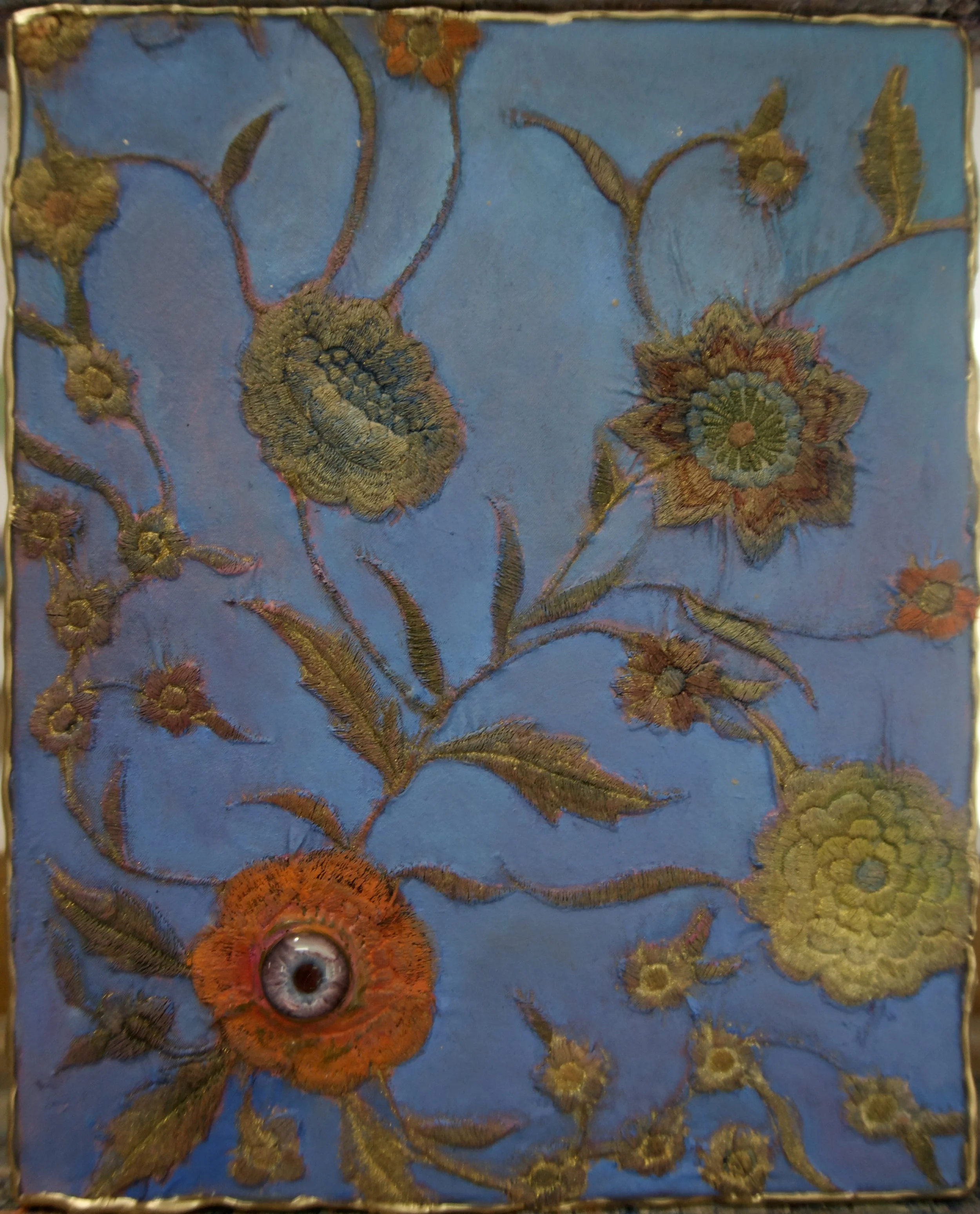 Natasha Zupan - Afterglow #36, mixed media collage with floral pattern with an eyeball in lower left corner