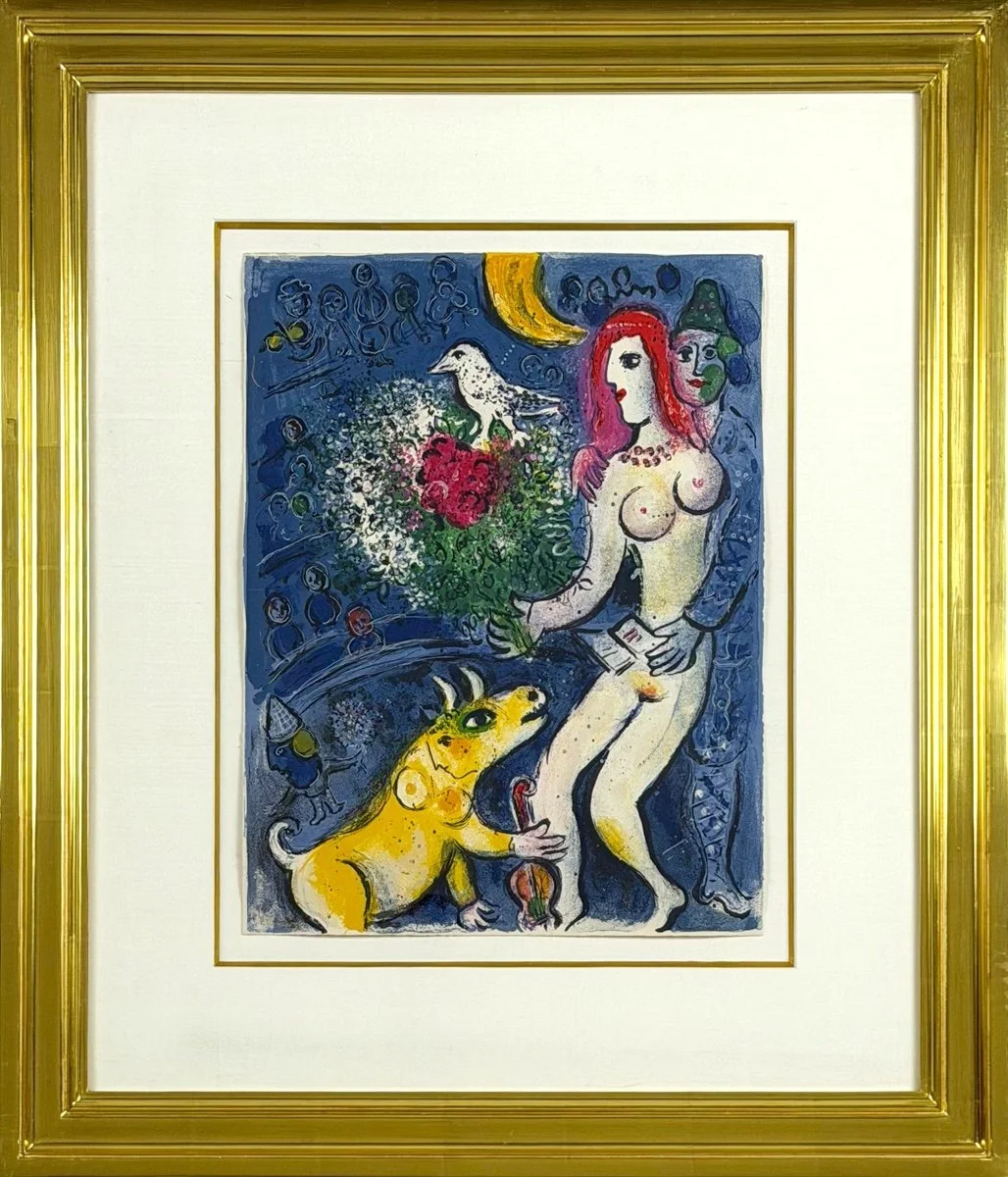 Marc Chagall Le Cirque M 522 framed lithograph, blue background with colorgul people, yellow creature, woman with pink hair holding a bouquet with a white bird