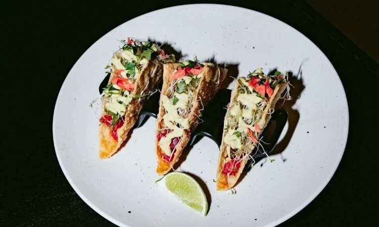 When the food, the drinks and the ambiance all align! 🙌 Creativity and high standards across the board at Black Sheep. 

These are our Ahi Tuna Tacos. Wonton Shell, Sushi Grade Tuna, Ponzu, Kimchi Slaw, Cilantro, Avocado Crema and Togarashi Spice. Y