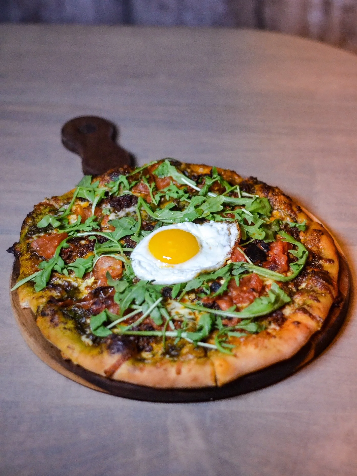 We are pro pizza for breakfast over here! Are you on board with that revolution? During brunch we have brick oven pizzas with unique toppings like the &lsquo;Crack of Dawn Now I&rsquo;m Yawnin&rsquo;. Scallion Pesto, Cheddar, Mozzarella, Tomato, Chor