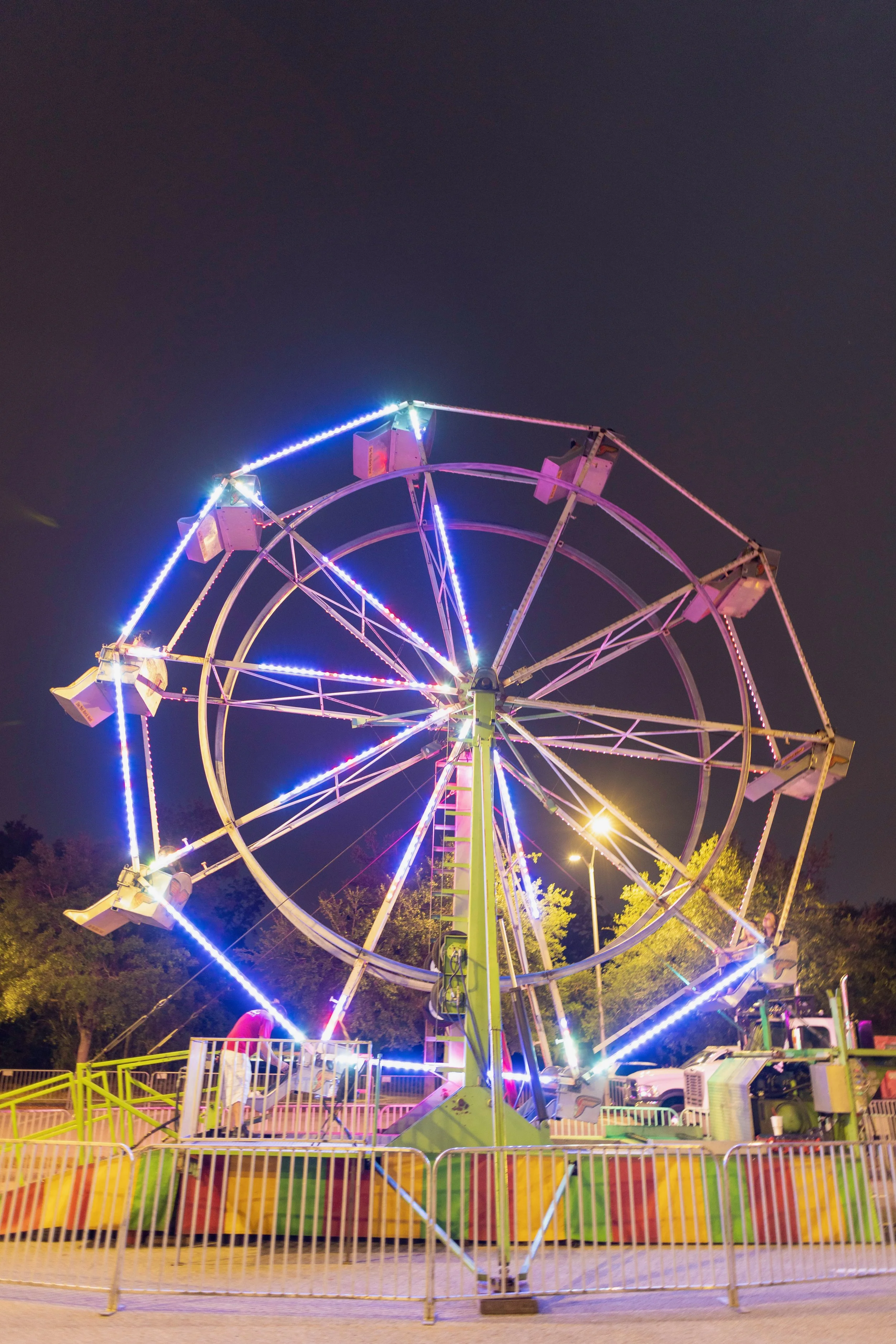 Photo of a ferris wheel at an event.