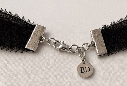 Adjustable silver closure and Babushka Dama tag on Venus silk choker
