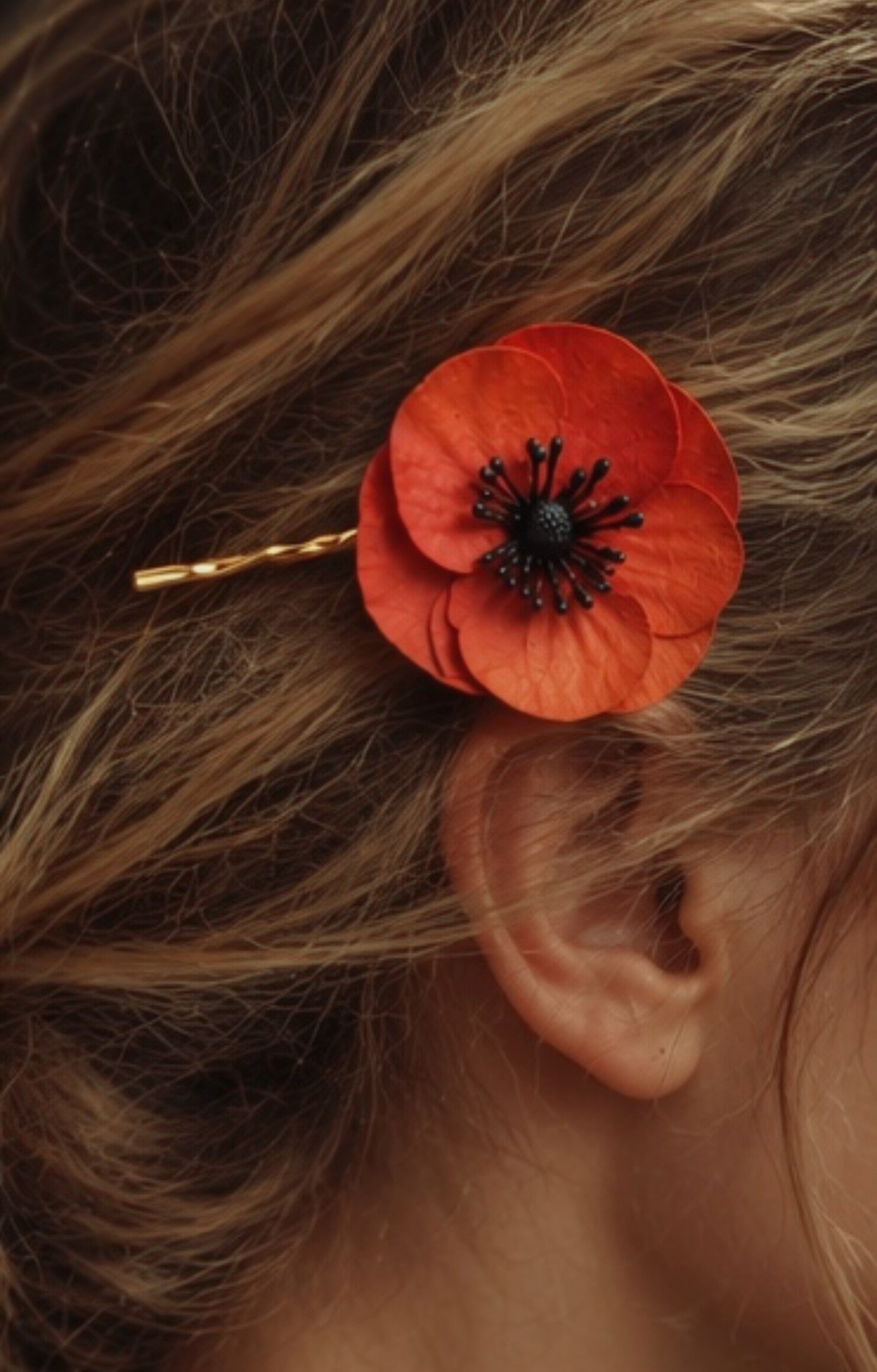 Poppy hair clip in hair.jpeg