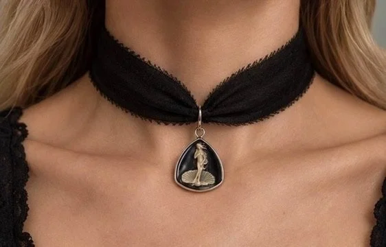 Venus black silk choker with cameo pendant worn around neck
