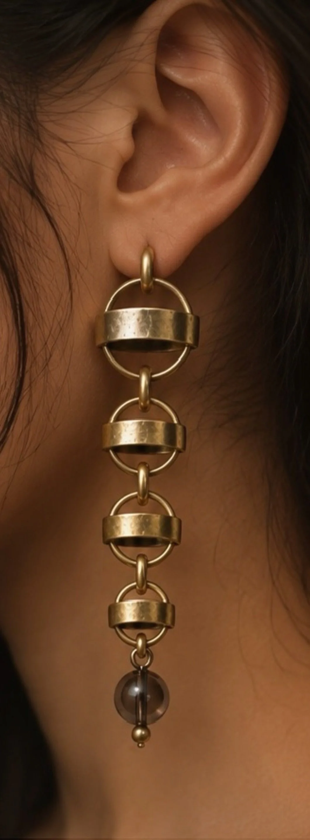Saturn Earrings on model.jpeg
