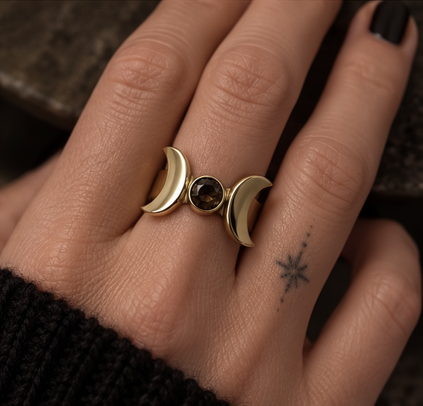 Brass triple moon gemstone ring worn on hand