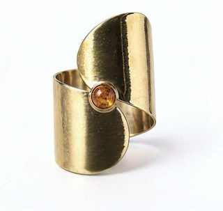 Brass statement ring with cabochon gemstone, front view.png