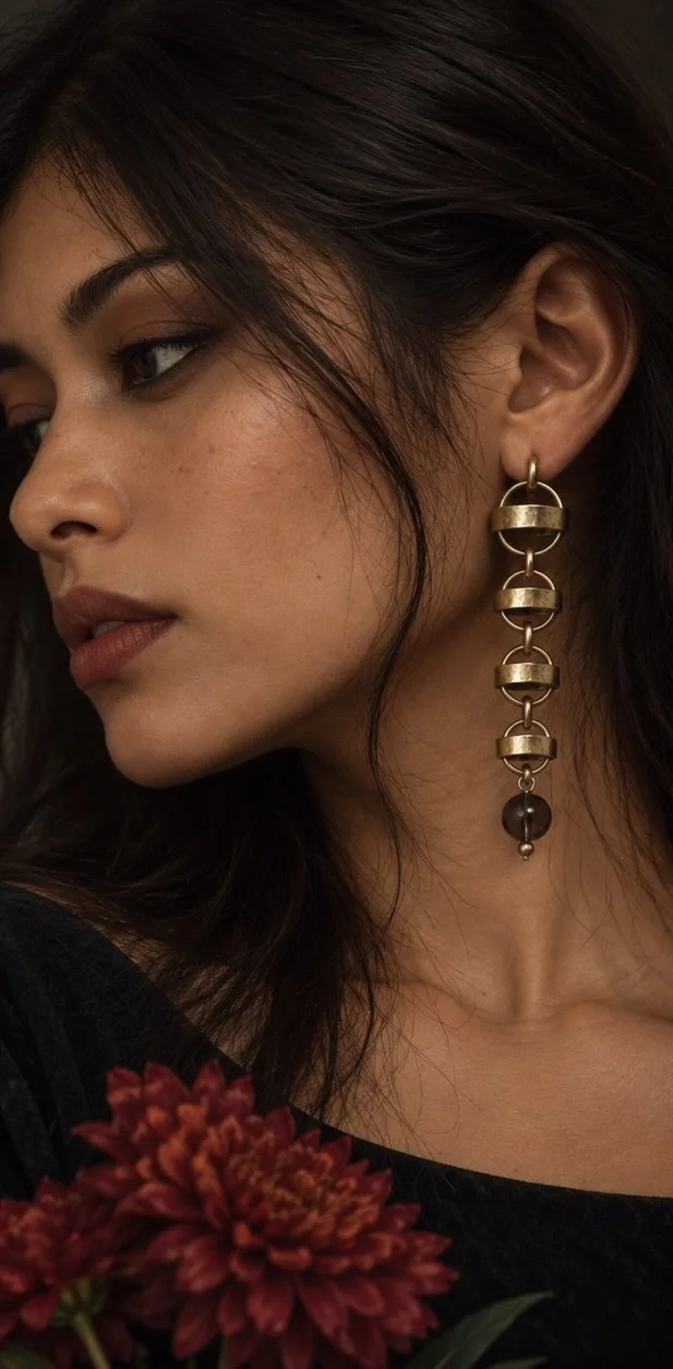 Saturn Earrings on another model.jpeg