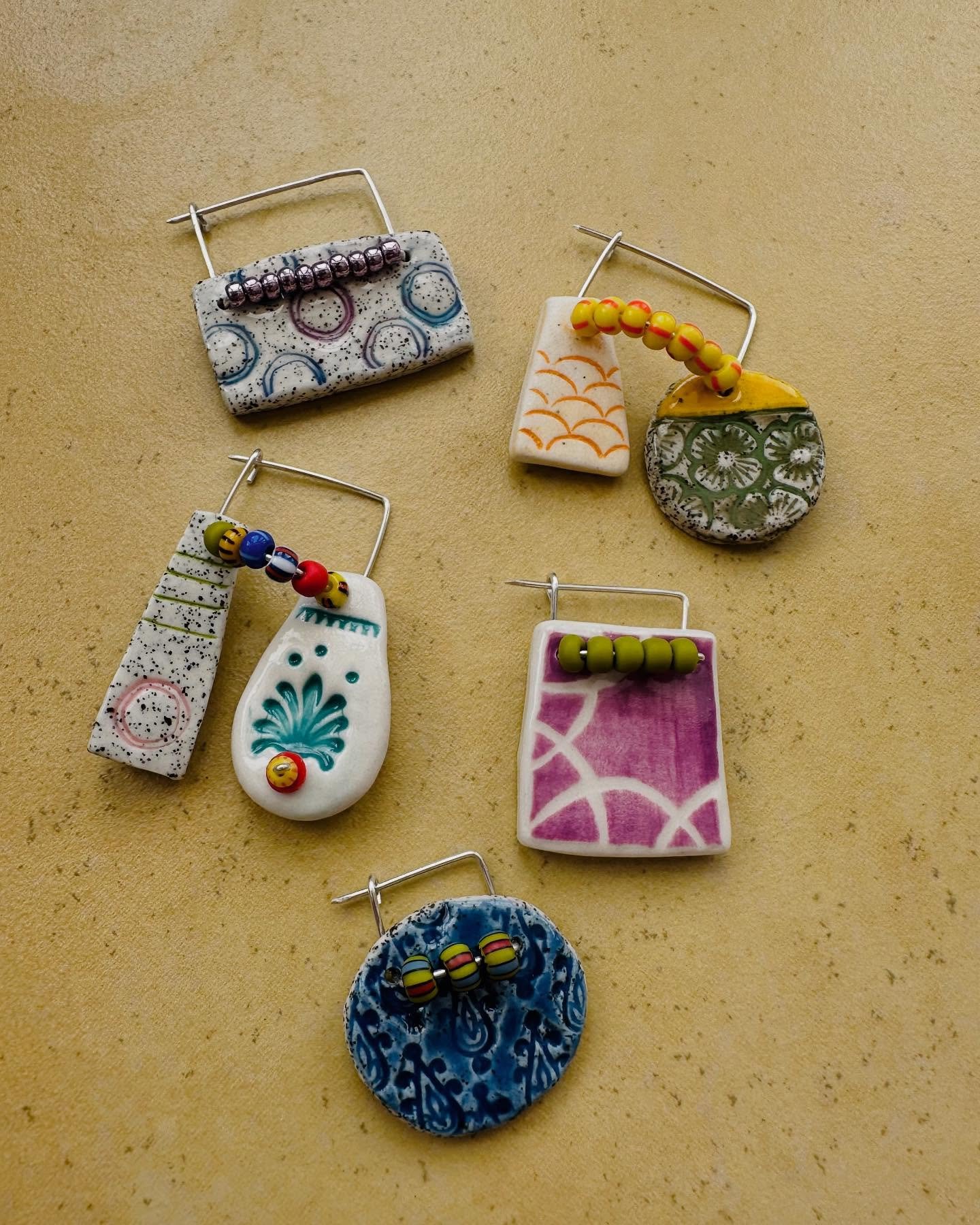 Some finished ceramic pieces, mini brooches. Coming soon to a website near you.  #ceramics #ceramicjewelry #claylove #jewelrydesigner #handmadejewelry
