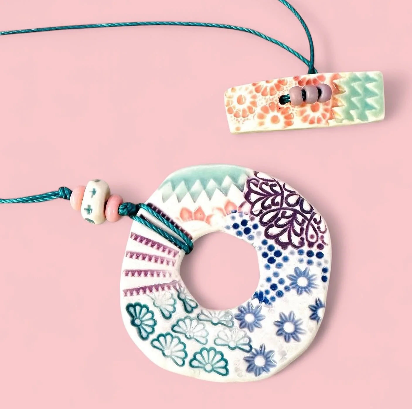 Toggles have landed! Hate a finicky clasp? The solution, a giant toggle clasp... 🩷🩵🩷🩵🩷. 
  #ceramic #handmadejewelry #ceramicjewelry #oneofakindjewelry #shopsmallbusinesses #shophandmade